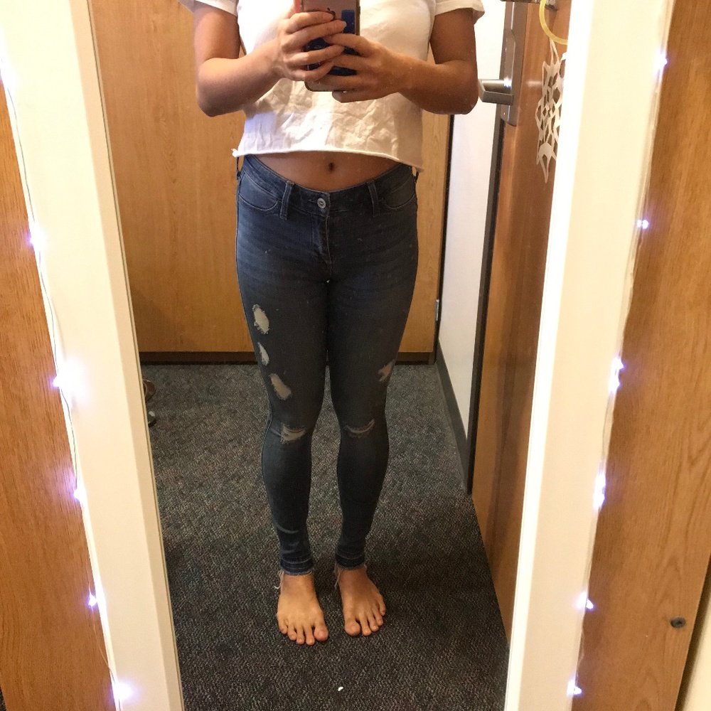 Hollister low rise dark wash distressed jeans